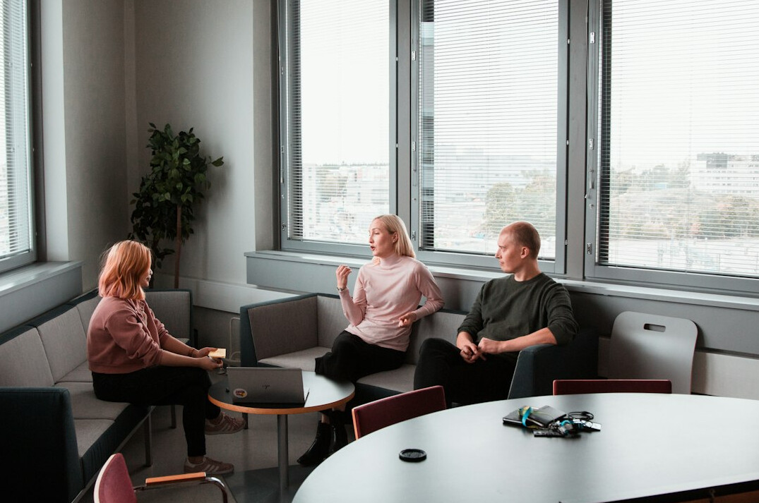 people negotiating at table