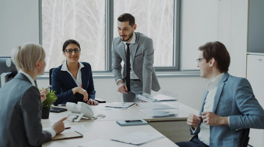 business people negotiating in office