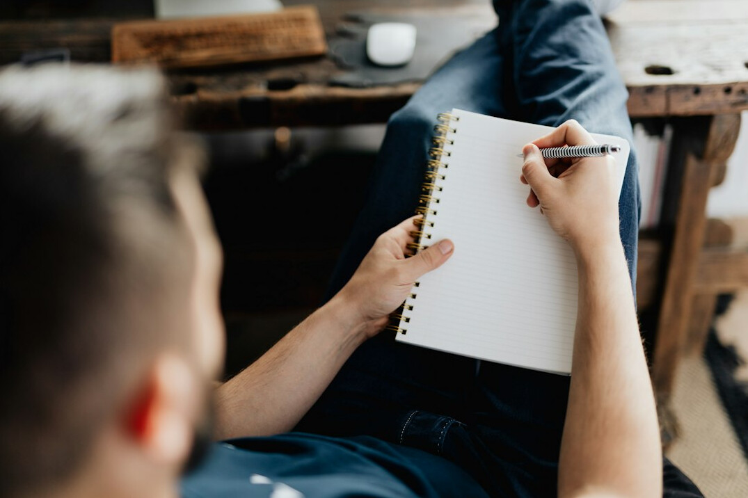 man preparing notes for discussion
